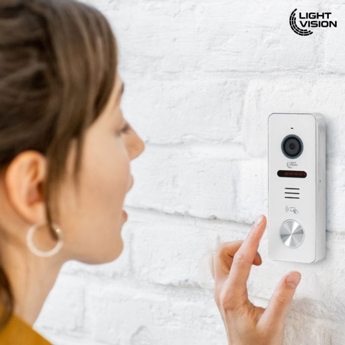 Комплект відеодомофона Light Vision з електрозамком: домофон 7" AMSTERDAM FHD Black, відеопанель 2Mp RIO FHD (RF) White зі зчитувачем Mifare, електромеханічний замок Trinix TRX Fass Steel